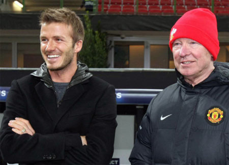 Beckham (trái) và ông thầy cũ Ferguson.