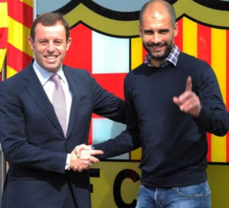 Chủ tịch Rosell và Pep Guardiola.