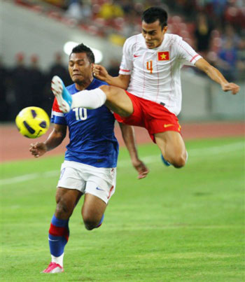 Tuyển Việt Nam thi đấu không thành công ở AFF Cup 2010. Ảnh: AFP.