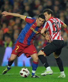 Villa (bên trái) đã ghi được hơn 20 bàn cho Barca từ đầu mùa.