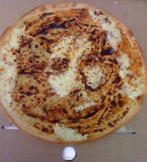 Chúa Giêsu hiện hình trên bánh pizza, Phi thường - kỳ quặc, Chua hien hinh, pizza, chuyen la, chuyen la co that