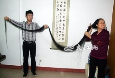 Nuôi tóc 21 năm dài gần 4 mét