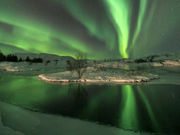Bắc cực quang ở Borealis, Iceland - Ảnh: Olgeir Andresson.