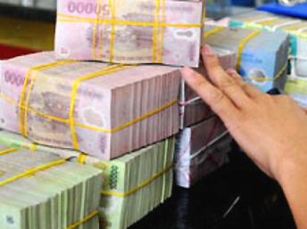 Chậm trễ giải quyết nợ xấu kìm hãm tăng trưởng kinh tế Việt Nam. Reuters