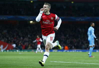 Jack Wilshere lập cú đúp giúp Arsenal đặt một chân vào vòng knock out Champions League - Ảnh: Reuters