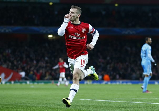 Jack Wilshere lập cú đúp giúp Arsenal đặt một chân vào vòng knock out Champions League - Ảnh: Reuters