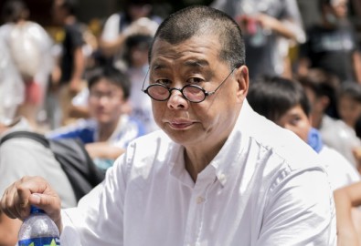 Ông trùm truyền thông Hồng Kông, người ủng hộ dân chủ là Jimmy Lai tham dự một cuộc biểu tình gần trụ sở chính phủ Hương Cảng vào ngày 28/9/ 2014. (Alex Ogle/AFP/Getty Images)