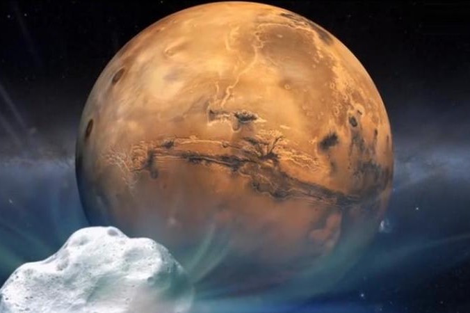 Sao chổi Siding Spring và sao Hỏa (Ảnh: NASA) 