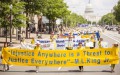 Những người theo tập Pháp Luân Công tuần hành kêu gọi chấm dứt cuộc đàn áp ở Trung Quốc hôm 17/7/2014 tại Washington. (Ảnh: Edward Dai/Thời báo Đại Kỷ Nguyên)