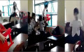 Nữ sinh  lớp 7/5, trường THCS Lý Tự Trọng (TP Trà Vinh, tỉnh Trà Vinh) bị 7 bạn đánh hội đồng - Ảnh cắt từ clip