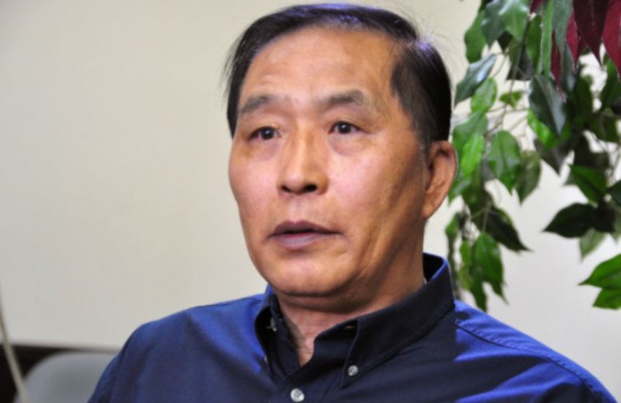 Hàn Quảng Sinh, cựu quan chức ngành tư pháp Thành phố Thẩm Dương, tỉnh Liêu Ninh đông bắc Trung Quốc của Đảng Cộng sản, trả lời phỏng vấn với tờ Epoch Times vào 10/6/2015. (Zhou Xing/Epoch Times)