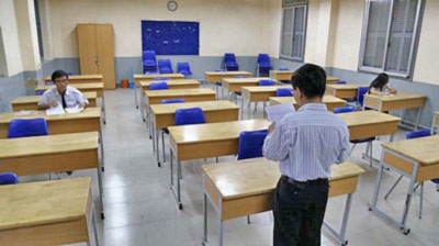 Phòng thi chỉ có 2 thí sinh thi môn sử tại HĐT trường THPT Nguyễn Thị Minh Khai chiều 2-6-2014. Ảnh - Như Hùng/songmoi.vn