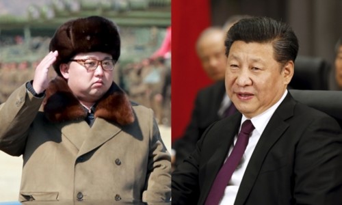 Chủ tịch Trung Quốc Tập Cận Bình (phải) và nhà lãnh đạo Triều Tiên Kim Jong-un. Ảnh: Reuters.