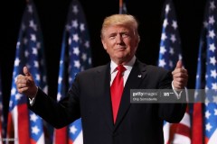 CLEVELAND, OH - JULY 21:  Republican presidential candidate Donald Trump gives two thumbs up to the crowd during the evening session on the fourth day of the Republican National Convention on July 21, 2016 at the Quicken Loans Arena in Cleveland, Ohio. Republican presidential candidate Donald Trump received the number of votes needed to secure the party's nomination. An estimated 50,000 people are expected in Cleveland, including hundreds of protesters and members of the media. The four-day Republican National Convention kicked off on July 18.  (Photo by Chip Somodevilla/Getty Images)