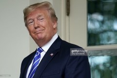 WASHINGTON, DC - JULY 31: U.S. President Donald Trump looks back at journalists after welcoming Mongolian President Battulga Khaltmaa to the White House July 31, 2019 in Washington, DC. Khaltmaa, who traveled to the White House to seek trade and military deals with the United States, also symbolically gifted a horse to Trump's son, Barron. Trump said the horse will be named "Victory." (Photo by Chip Somodevilla/Getty Images)